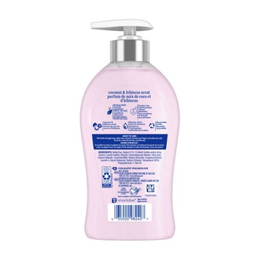 Dos du savon pour les mains Softsoap noix de coco et d’hibiscus, flacon pompe rose.