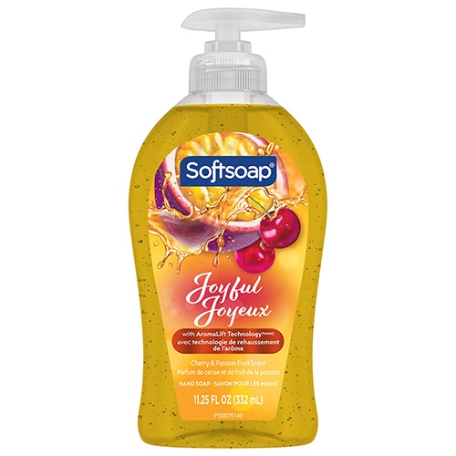 Face avant du flacon de savon pour les mains Softsoap Joyful (11,25 oz liq.). Il présente des motifs de cerise et de fruit de la passion ainsi que la mention « AromaLift Technology » en anglais et en français.