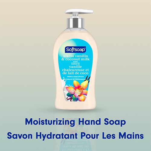 Bouteille de savon pour les mains Softsoap Vanille Chaleureuse et Lait de Coco centrée avec son reflet et le nom du produit écrit ci-dessous.